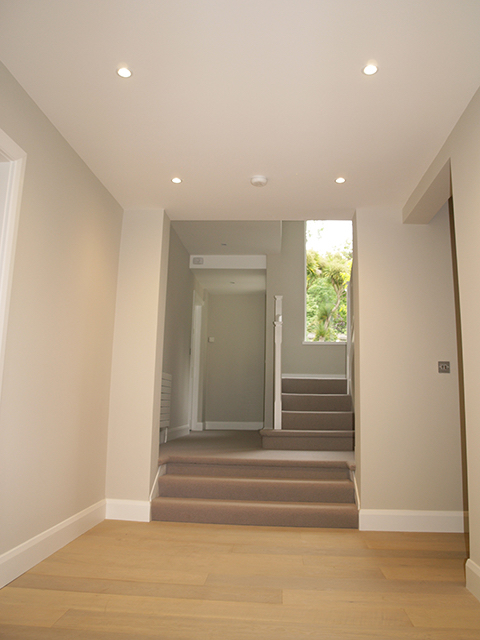Spacious and bright entrance hall maximising light and view to mature gardens